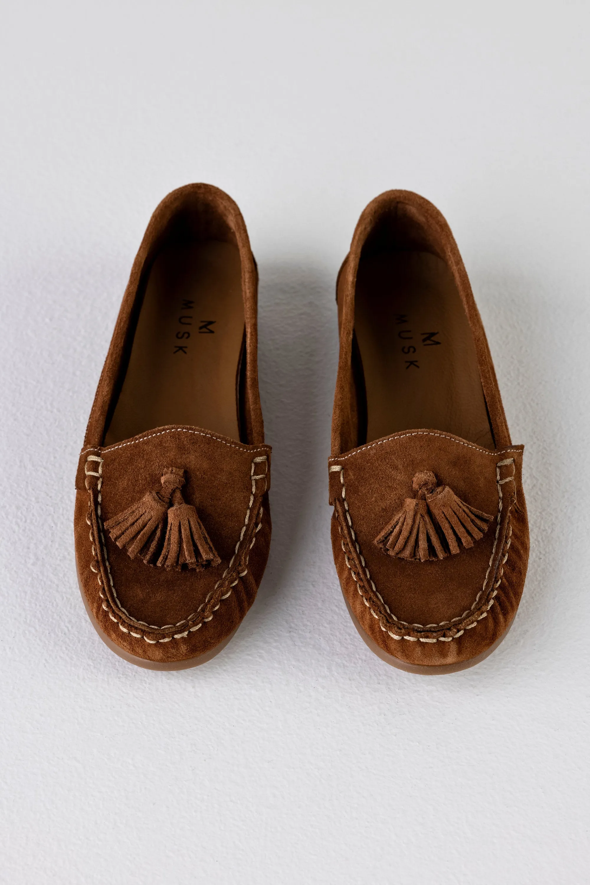Leather suede moccasin with tassels